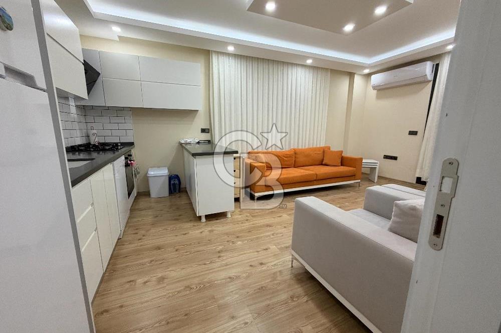 Didim Cumhuriyet'te merkezi konumda 2+1 Bahçe katı Satılık Daire