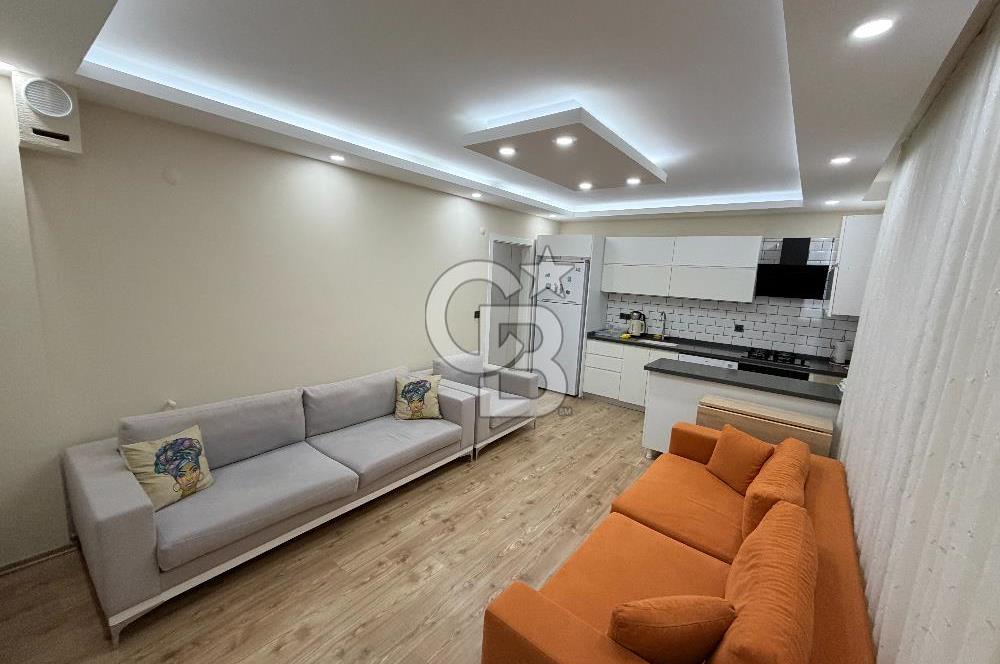 Didim Cumhuriyet'te merkezi konumda 2+1 Bahçe katı Satılık Daire