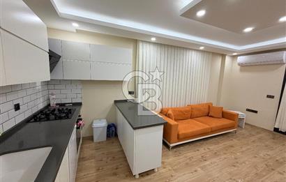 Didim Cumhuriyet'te merkezi konumda 2+1 Bahçe katı Satılık Daire