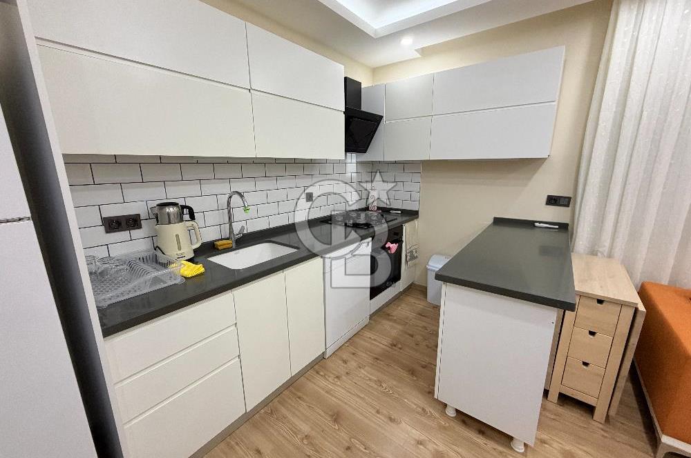 Didim Cumhuriyet'te merkezi konumda 2+1 Bahçe katı Satılık Daire