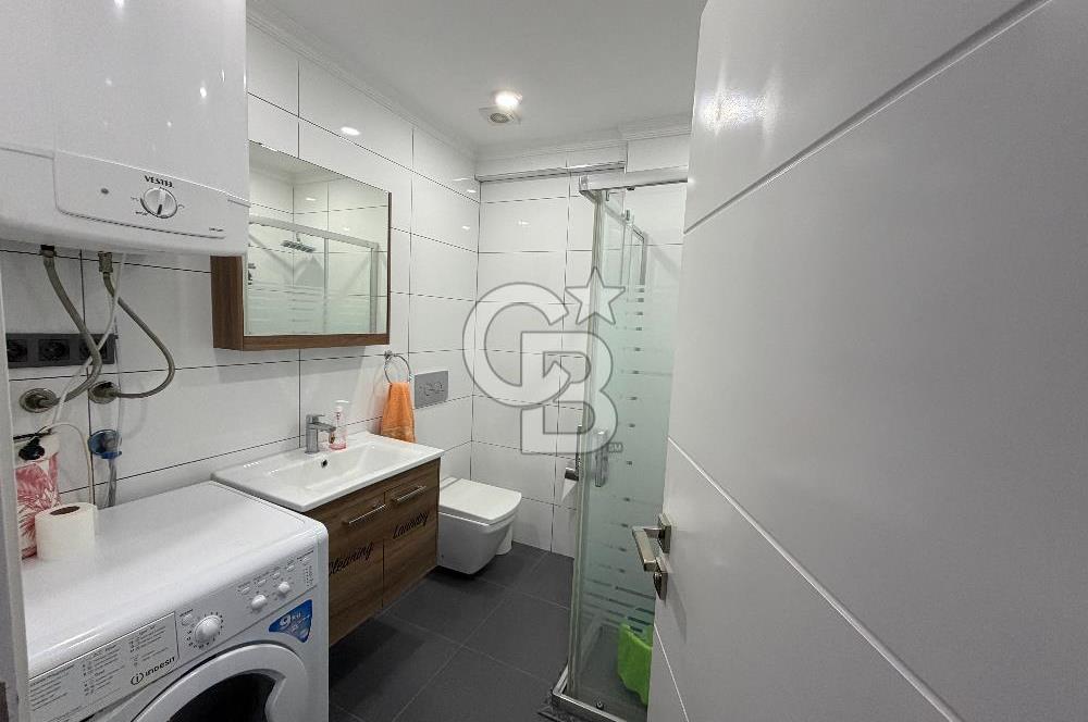 Didim Cumhuriyet'te merkezi konumda 2+1 Bahçe katı Satılık Daire