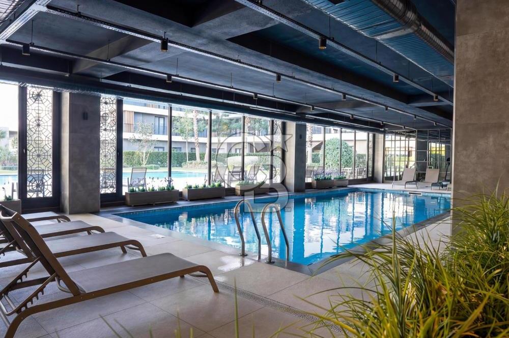 Gaziemir ARYOM KORU 1. Etap'ta 3+1 Bahçe Katı Satılık Daire