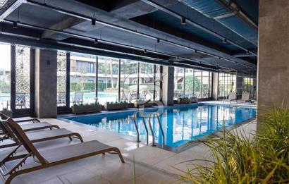 Gaziemir ARYOM KORU 1. Etap'ta 3+1 Bahçe Katı Satılık Daire