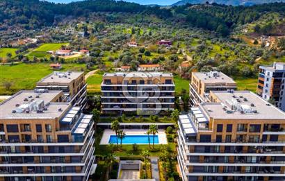 Gaziemir ARYOM KORU 1. Etap'ta 3+1 Bahçe Katı Satılık Daire