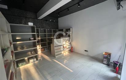 BORNOVA CADDE ÜZERİNDE SATILIK TİCARİ RUHSATLI DÜKKAN
