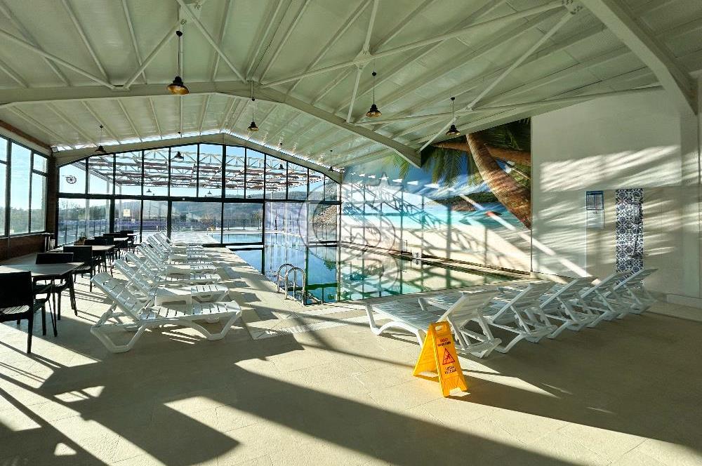 CB CLASS İZNİKTE DOĞA KONSEPTLİ AKTİF GETİRİLİ DAĞ EVLERİ TESİSİ