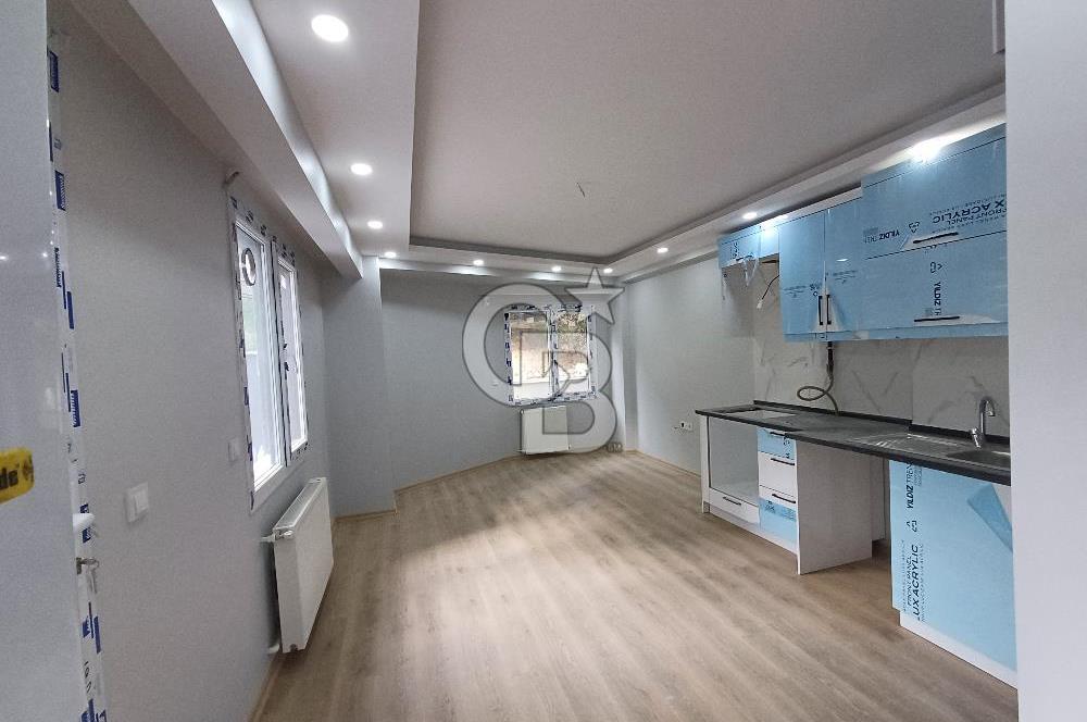 Haznedar Meydanda Sıfır Bina'da Kiralık Bahçe Katı Daire!