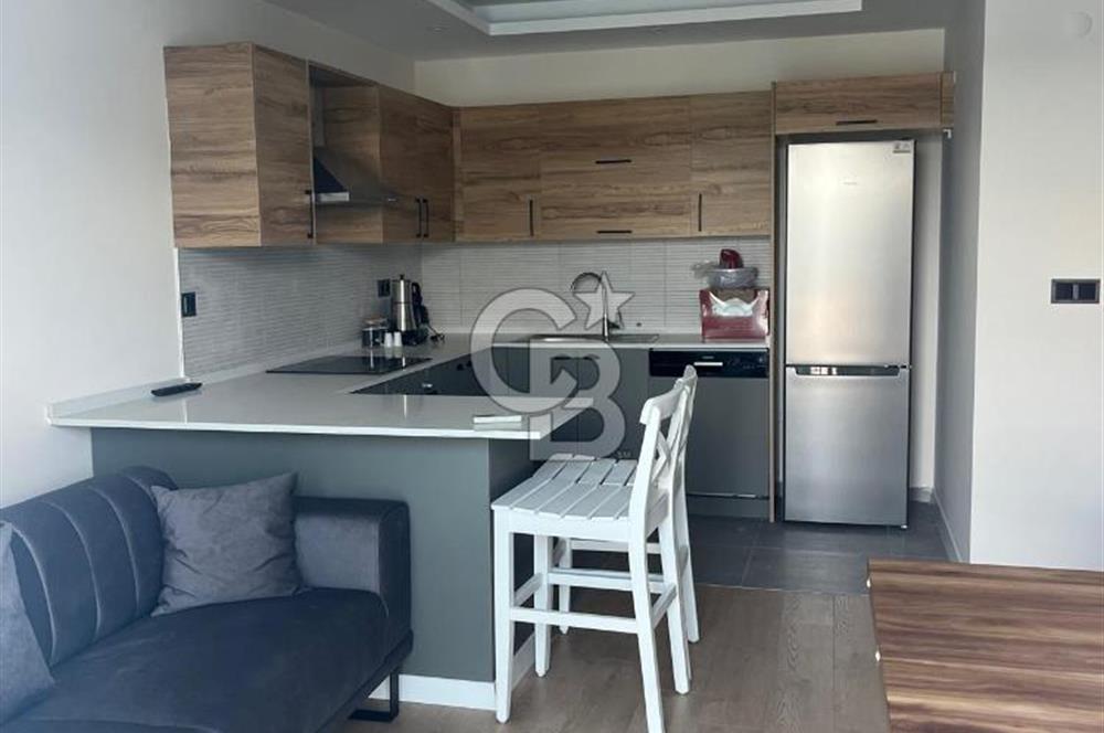 Karaburun Mordoğan Merkez'de Denize Sıfır 2+1 Daire