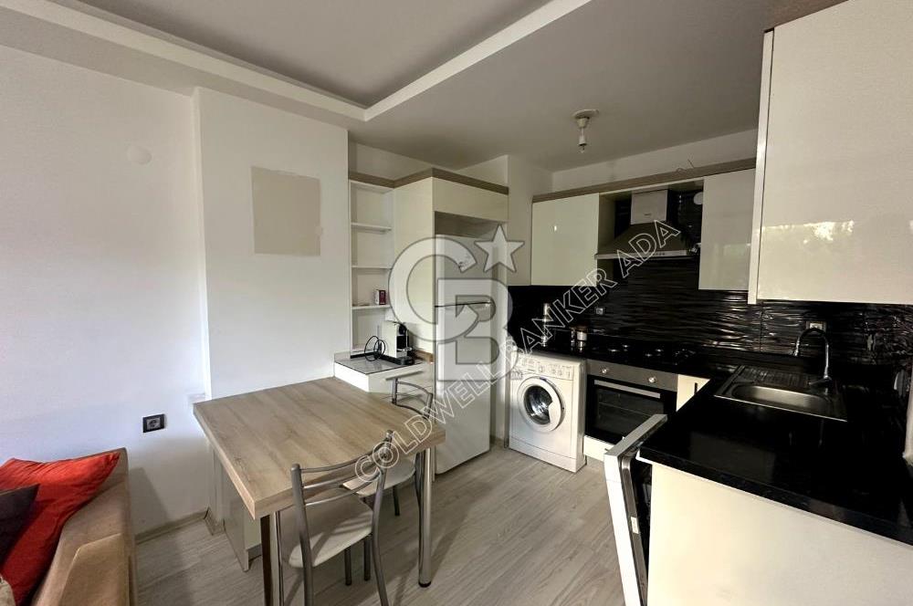 KUSADASI MERKEZDE SAHİLE YÜRÜME MESAF SATILIK 1+1 EŞYALI DAİRE