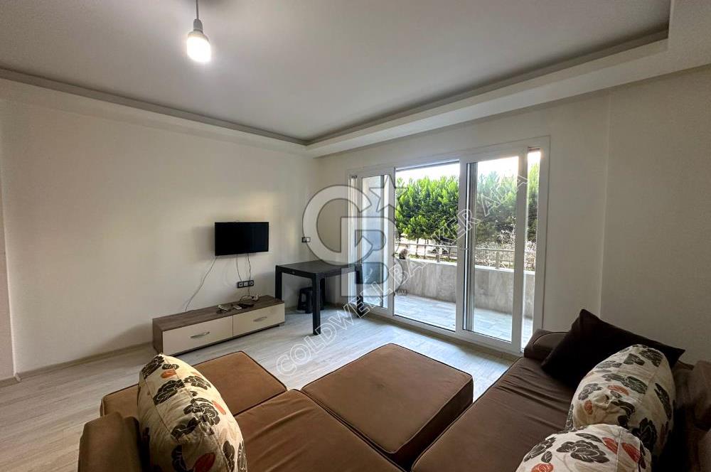 KUSADASI MERKEZDE SAHİLE YÜRÜME MESAF SATILIK 1+1 EŞYALI DAİRE