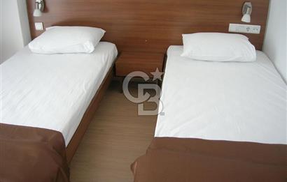 Eceabat Deniz Manzaralı 24 Odalı Otel + 712 m² İmarlı Arsa – Tarih ve Turizm Cenneti!