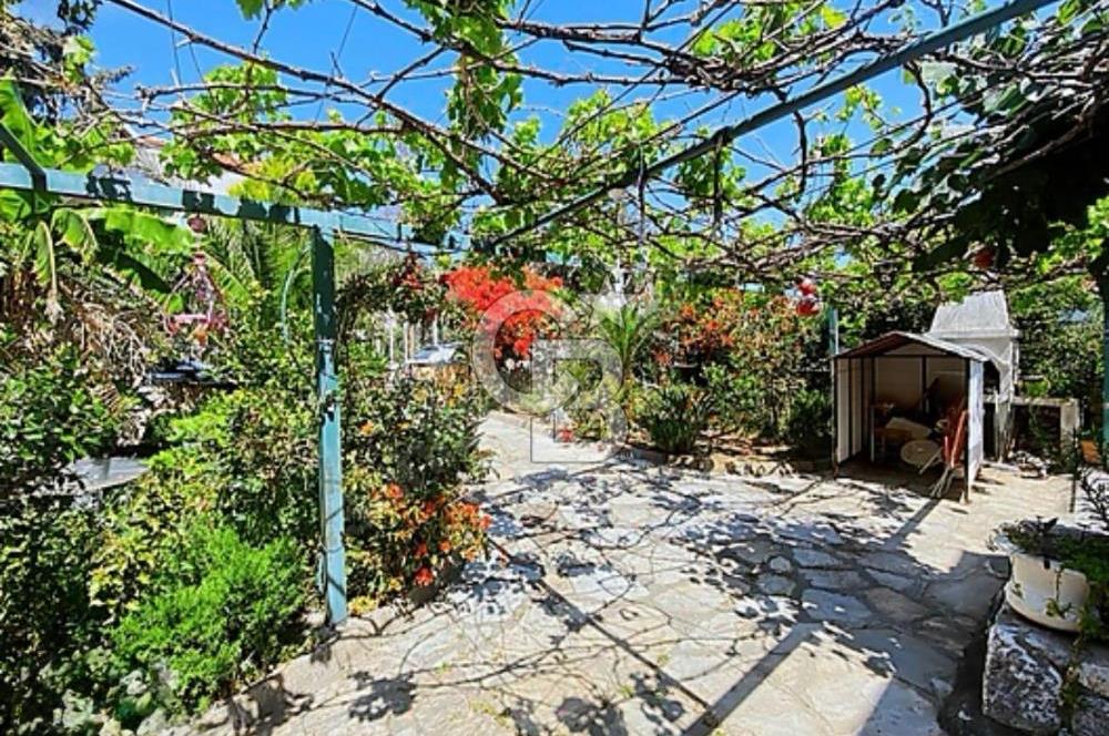 MARMARİS TURUNÇ'TA MERKEZİ KONUMDA SATILIK MÜSTAKİL TRİPLEKS EV