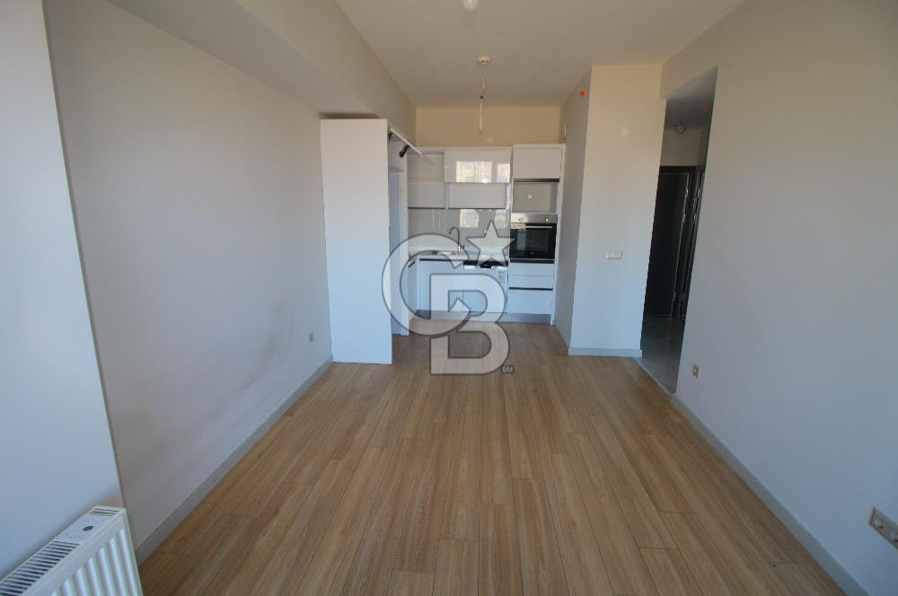 İzka Merkez Yaşam Konak Deniz Manzaralı 1+1 Satılık Daire