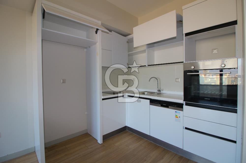 İzka Merkez Yaşam Konak Deniz Manzaralı 1+1 Satılık Daire