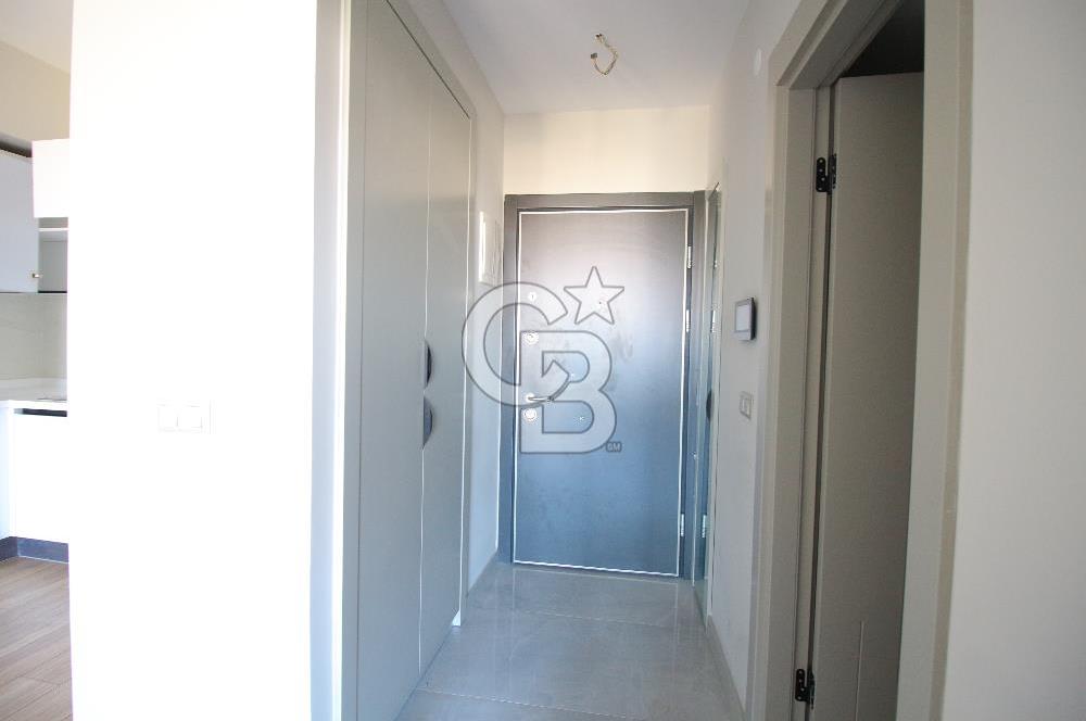 İzka Merkez Yaşam Konak Deniz Manzaralı 1+1 Satılık Daire