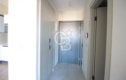 İzka Merkez Yaşam Konak Deniz Manzaralı 1+1 Satılık Daire