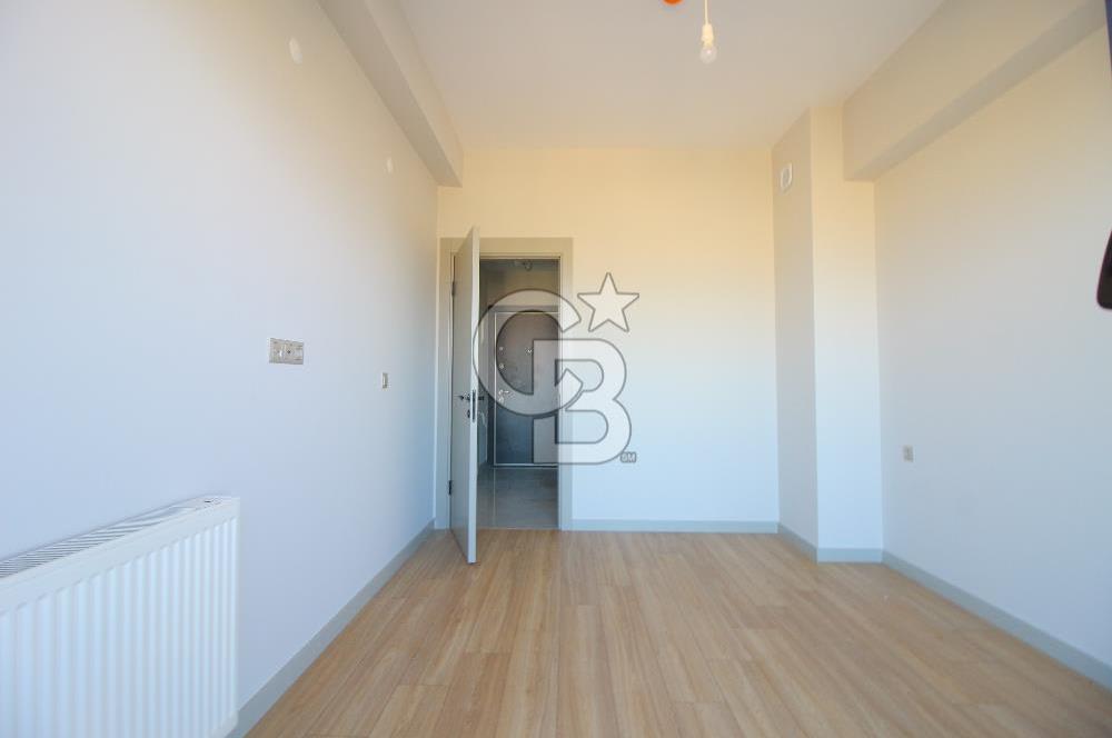 İzka Merkez Yaşam Konak Deniz Manzaralı 1+1 Satılık Daire