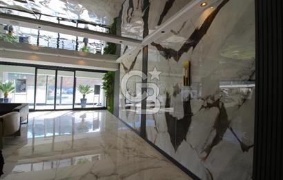 İzka Merkez Yaşam Konak Deniz Manzaralı 1+1 Satılık Daire