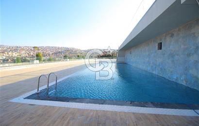 İzka Merkez Yaşam Konak Deniz Manzaralı 1+1 Satılık Daire