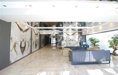 İzka Merkez Yaşam Konak Deniz Manzaralı 1+1 Satılık Daire