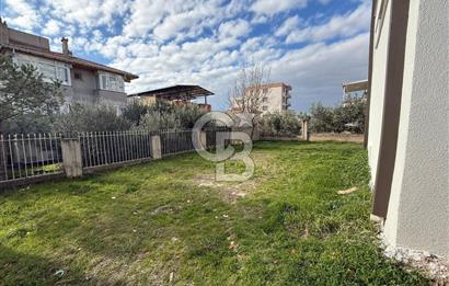 Bornova’da Satılık Altı Dükkan Üstü Daire Olan İki Katlı Bina