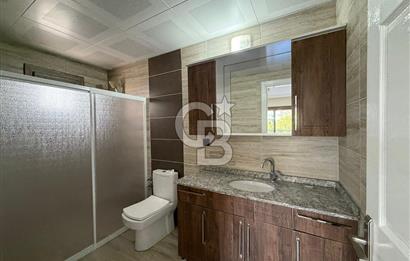 Bornova’da Satılık Altı Dükkan Üstü Daire Olan İki Katlı Bina