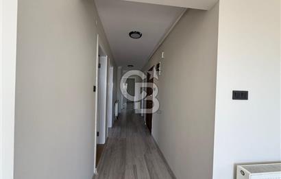 Bornova’da Satılık Altı Dükkan Üstü Daire Olan İki Katlı Bina