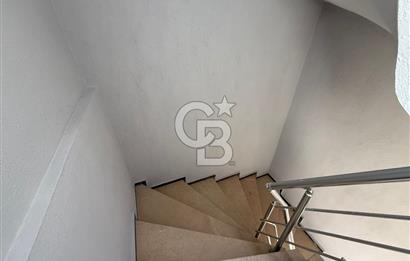 Bornova’da Satılık Altı Dükkan Üstü Daire Olan İki Katlı Bina