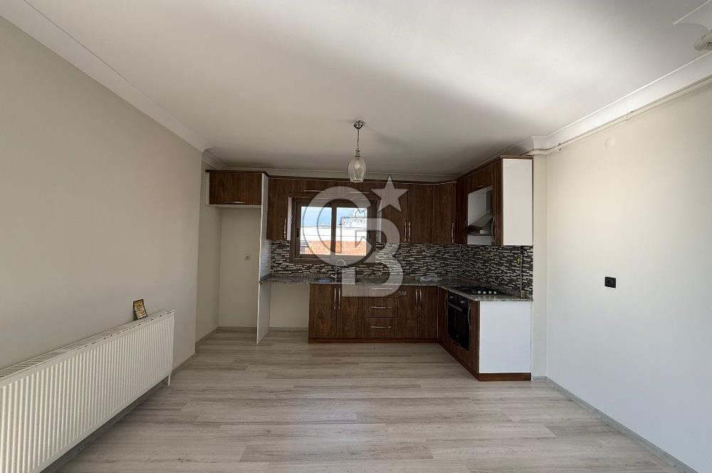 Bornova’da Satılık Altı Dükkan Üstü Daire Olan İki Katlı Bina