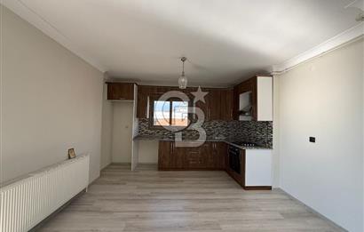 Bornova’da Satılık Altı Dükkan Üstü Daire Olan İki Katlı Bina