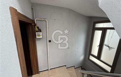 Bornova’da Satılık Altı Dükkan Üstü Daire Olan İki Katlı Bina