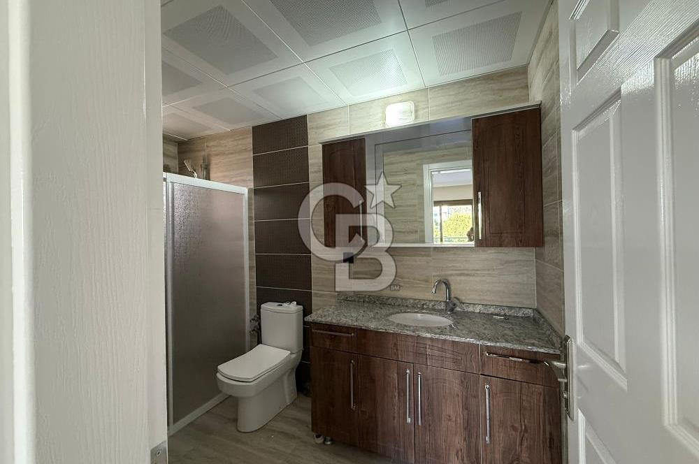 Bornova’da Satılık Altı Dükkan Üstü Daire Olan İki Katlı Bina