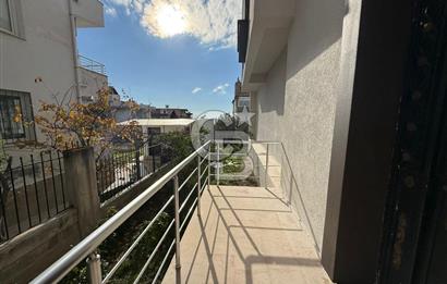 Bornova’da Satılık Altı Dükkan Üstü Daire Olan İki Katlı Bina