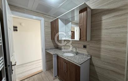 Bornova’da Satılık Altı Dükkan Üstü Daire Olan İki Katlı Bina