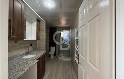 Bornova’da Satılık Altı Dükkan Üstü Daire Olan İki Katlı Bina