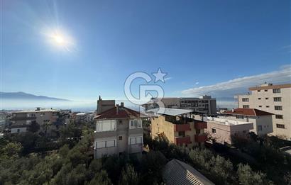 Bornova’da Satılık Altı Dükkan Üstü Daire Olan İki Katlı Bina