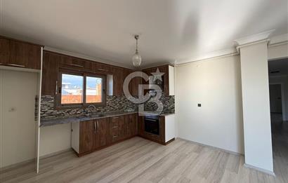 Bornova’da Satılık Altı Dükkan Üstü Daire Olan İki Katlı Bina