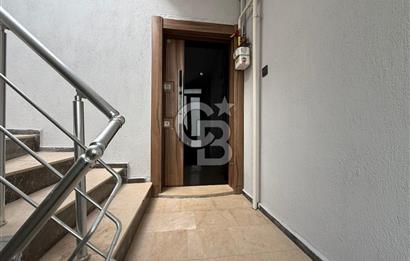 Bornova’da Satılık Altı Dükkan Üstü Daire Olan İki Katlı Bina