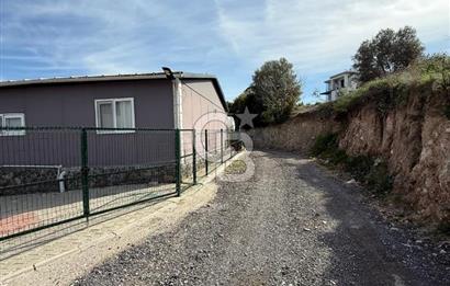 Buca Belenbaşı'nda Satılık 290m2 Elektrik Suyu Olan Etrafı Çevrili Tarla 