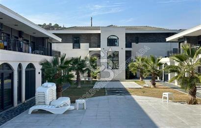 Kuşadası Kuştur Plajı ‘na Yürüme Mesafesinde 1+1 şık eşyalı kiralık daire