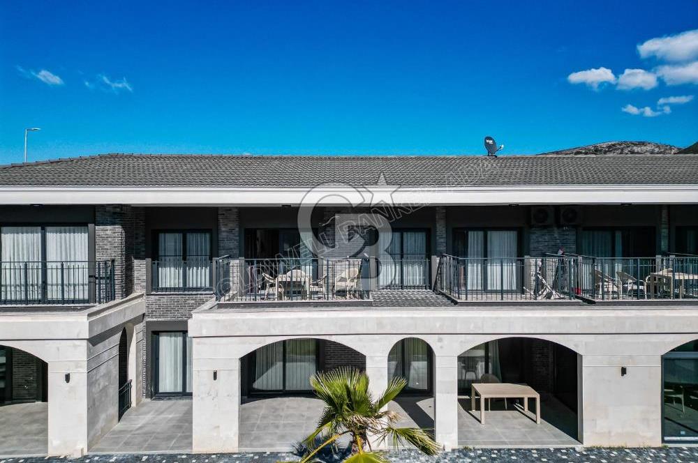 Kuşadası Kuştur Plajı ‘na Yürüme Mesafesinde 1+1 şık eşyalı kiralık daire