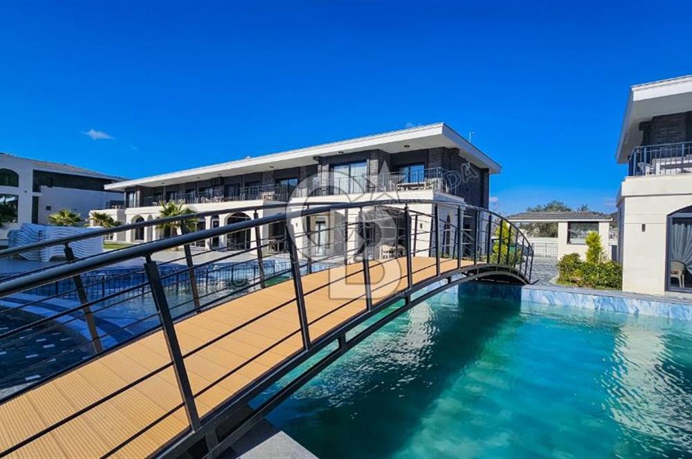 Kuşadası Kuştur Plajı ‘na Yürüme Mesafesinde 1+1 şık eşyalı kiralık daire