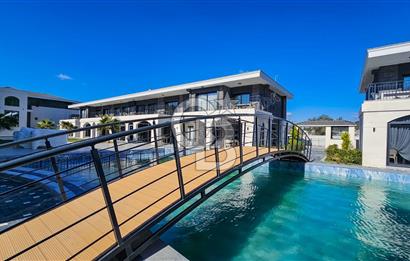 Kuşadası Kuştur Plajı ‘na Yürüme Mesafesinde 1+1 şık eşyalı kiralık daire