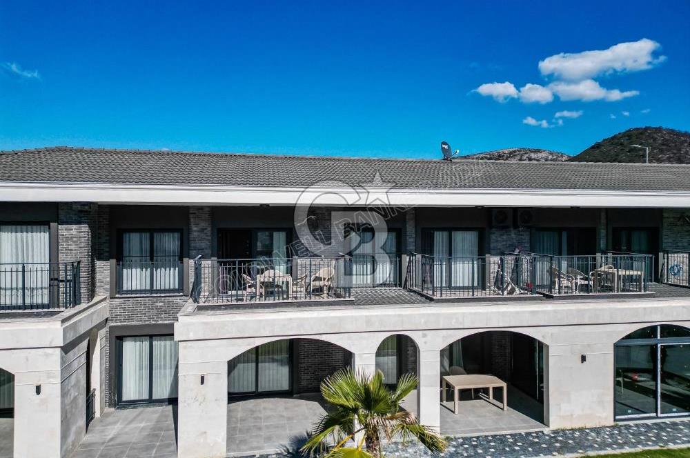 Kuşadası Kuştur Plajı ‘na Yürüme Mesafesinde 1+1 şık eşyalı kiralık daire