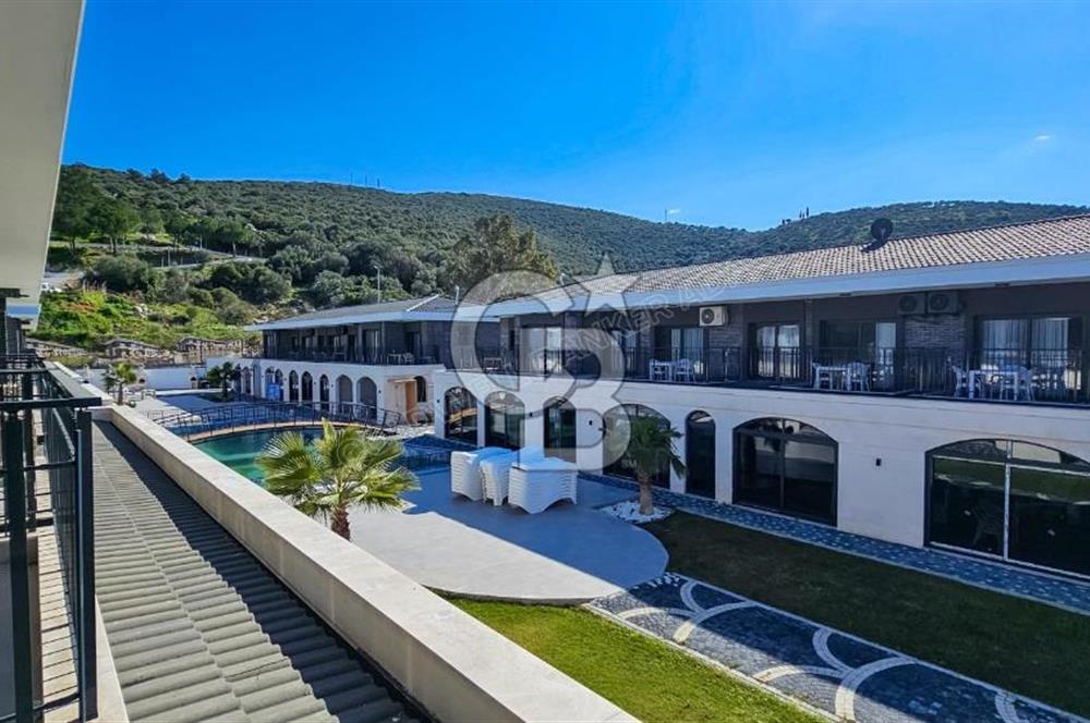 Kuşadası Kuştur Plajı ‘na Yürüme Mesafesinde 1+1 şık eşyalı kiralık daire