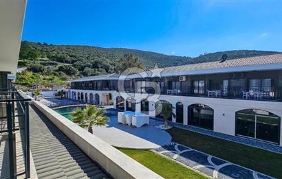 Kuşadası Kuştur Plajı ‘na Yürüme Mesafesinde 1+1 şık eşyalı kiralık daire