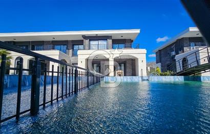 Kuşadası Kuştur Plajı ‘na Yürüme Mesafesinde 1+1 şık eşyalı kiralık daire