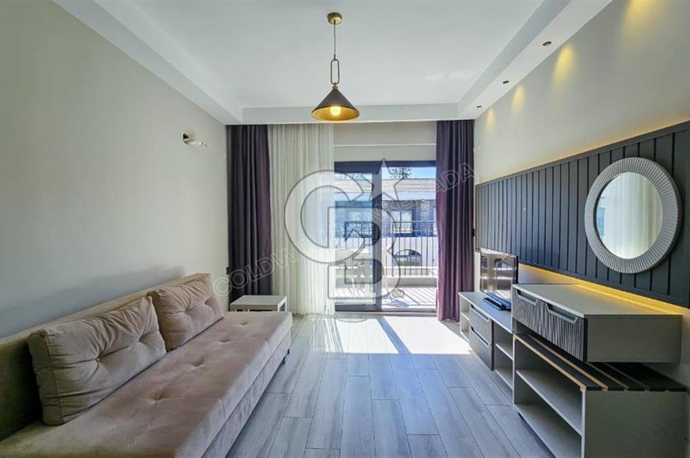 Kuşadası Kuştur Plajı ‘na Yürüme Mesafesinde 1+1 şık eşyalı kiralık daire