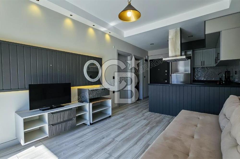 Kuşadası Kuştur Plajı ‘na Yürüme Mesafesinde 1+1 şık eşyalı kiralık daire