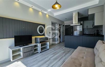 Kuşadası Kuştur Plajı ‘na Yürüme Mesafesinde 1+1 şık eşyalı kiralık daire